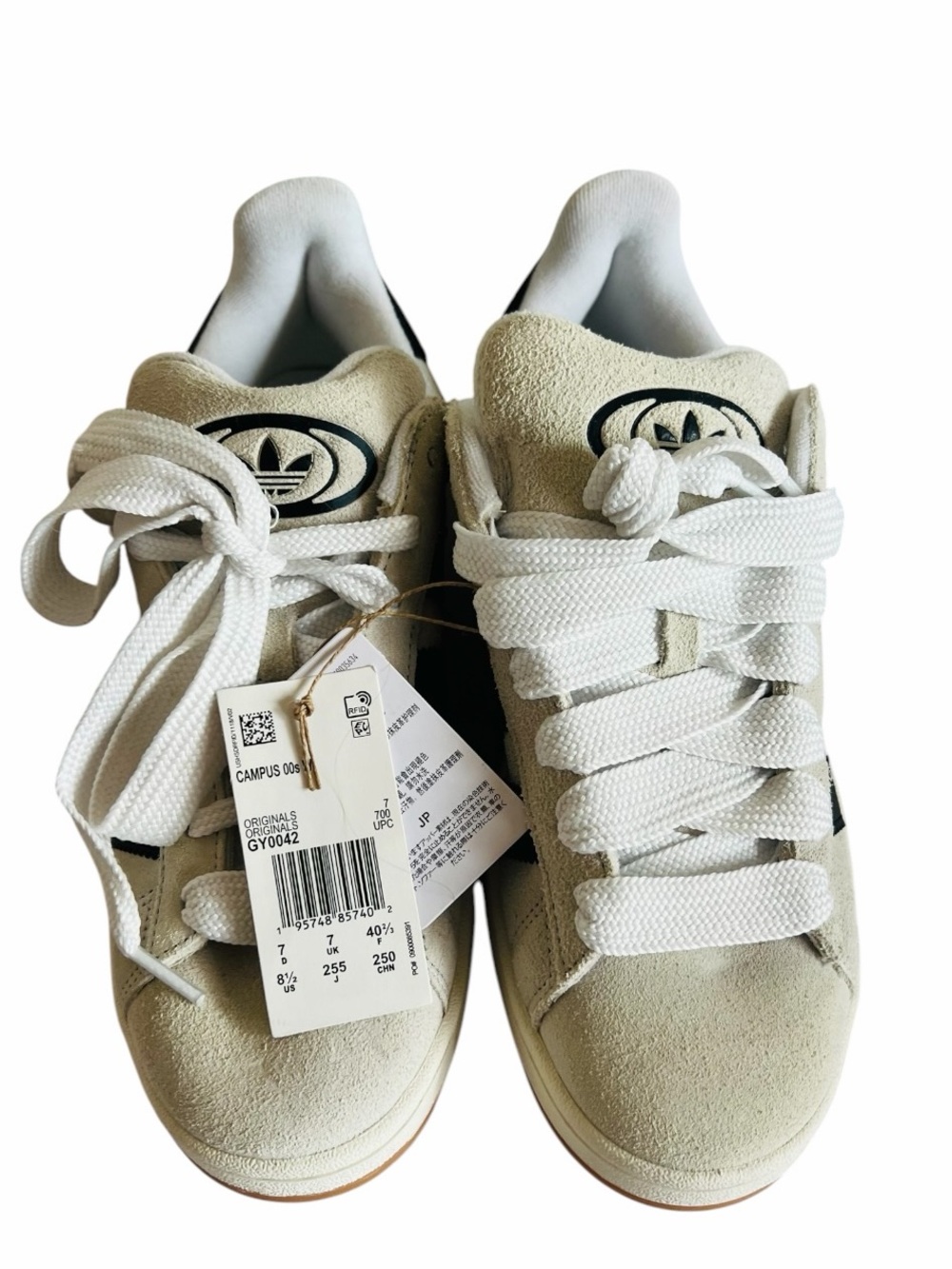 adidas Women’s Off-White Suede Sneakers with Black Stripes